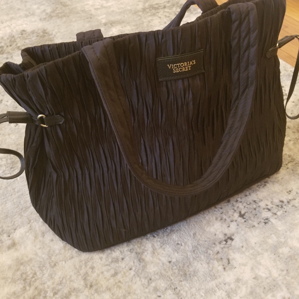 Victoria Secrets black pocketbook